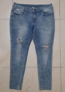 Low Rise Blue Ripped Demins