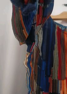 Vibrant Striped Blouse with Tassel Trim