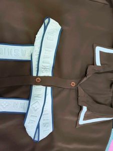 Brown shirt pattern top with bow in front
