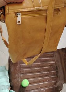 Mustard Sling Bag. Looks Very Good