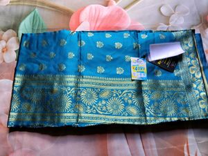 Stunning Blue Silk Saree with Gold Border