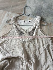 Embellished Neckline Sleeveless Tunic