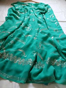 Elegant Green Embroidered Saree with readymade blo