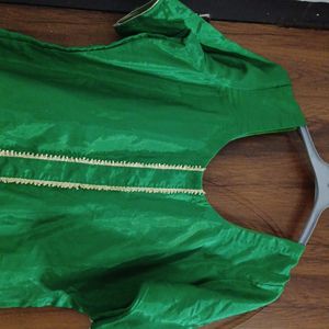Green silk color kutra with lace in front. perfect for mending functions.  custom made..size 42.never worn