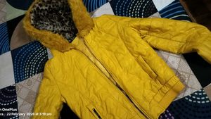 Yellow Quilted Jacket with Faux Fur Hood