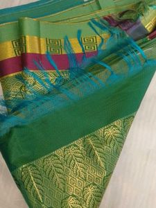 Elegant Green Saree with Gold Leaf Motifs