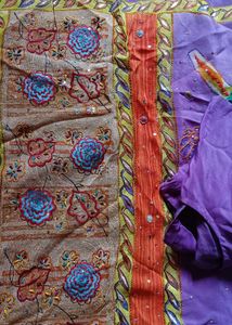Vibrant Purple Saree with Floral Embroidery