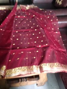 Elegant Maroon Saree with Gold Embellishments