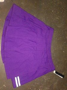 white tee with purple skirt