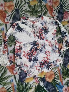 Floral Print Tie-Neck Peplum Top