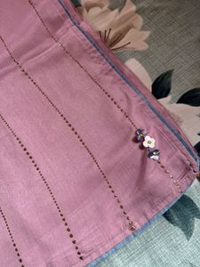 Elegant Pink Saree with Floral Embellishments