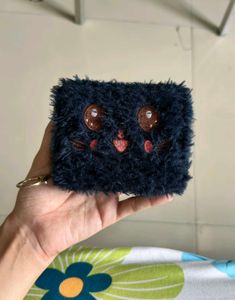 dark blue faux fur and embroidered cat feature