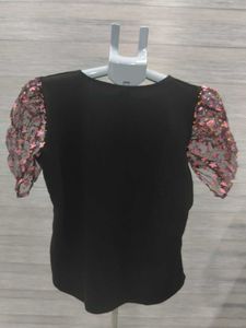 Chic Black Top with Floral Puff Sleeves