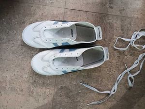 White Casual Sneakers with Blue Stripes