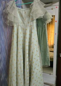 Stunning Festive Light Blue Gown with Gold Motifs