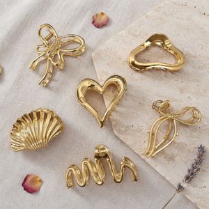 golden metallic claw clips