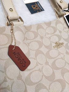 Coach Signature Pattern Handbag