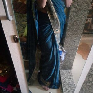 Elegant Teal Saree with Paisley Border
