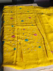 Vibrant Yellow saree with blowse  Embellishments