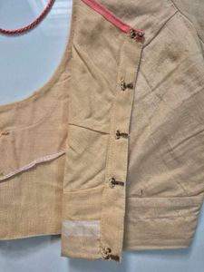 beige cotton blouse