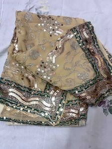 Elegant Cream Saree with Embellished Border