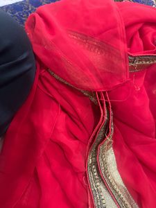 Elegant Red Saree with Golden Border