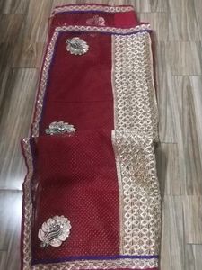 Gorgeous Maroon Net Saree with blouse