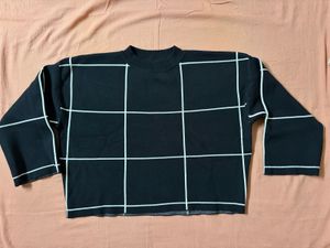 Black and white grid sweater