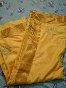Elegant Yellow Silk Saree with Gold Border