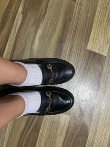 Black leather lofers