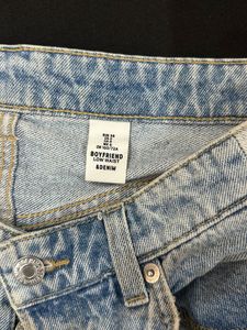 Distressed Blue Denim Jeans