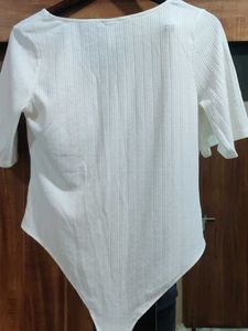 Chic White Ribbed V-Neck Bodysuit
