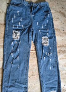 Distressed Blue Denim Jeans