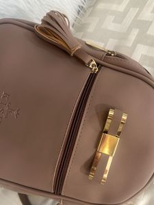 Stylish Brown Backpack with Bow Detail