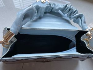 Handbag Or Slingbag