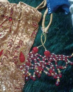 golden lehenga with maroon dupatta
