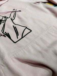 Pastel Pink Hoodie with Fun Graphic