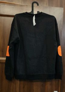Black Crew Neck Sweatshirt with Orange Accents
