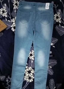 Ripped Light Wash Denim Jeans