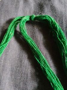 Green Beaded Necklace with Silver Charms