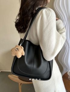 Stylish Black Hobo Bag with Charm