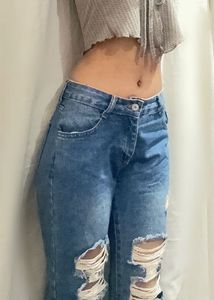 Distressed Blue Denim Jeans