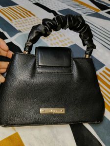 Chic Black Handbag with Scrunchie Handle