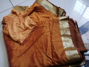 Embellished Rust Orange Art Silk Saree with Heavy