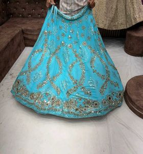 Stunning Blue Mirror Work Lehenga Set