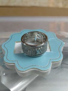 Sparkling Silver Ring with Monogram Detail