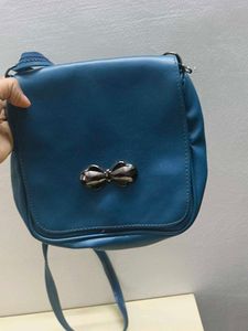 Blue Crossbody Bag with Bow Detail