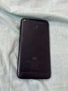 Redmi note 11 with cracked screen
