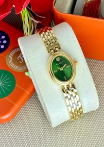 Gucci Gold &amp; Green Watch