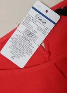 Coral Long Sleeve Top with Ruffled Cuffs